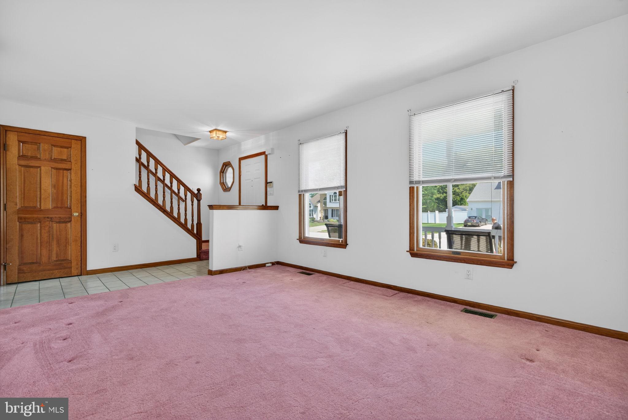504 Ash Street Glassboro, NJ 08028 - Photo 8 of 42 an empty room with windows