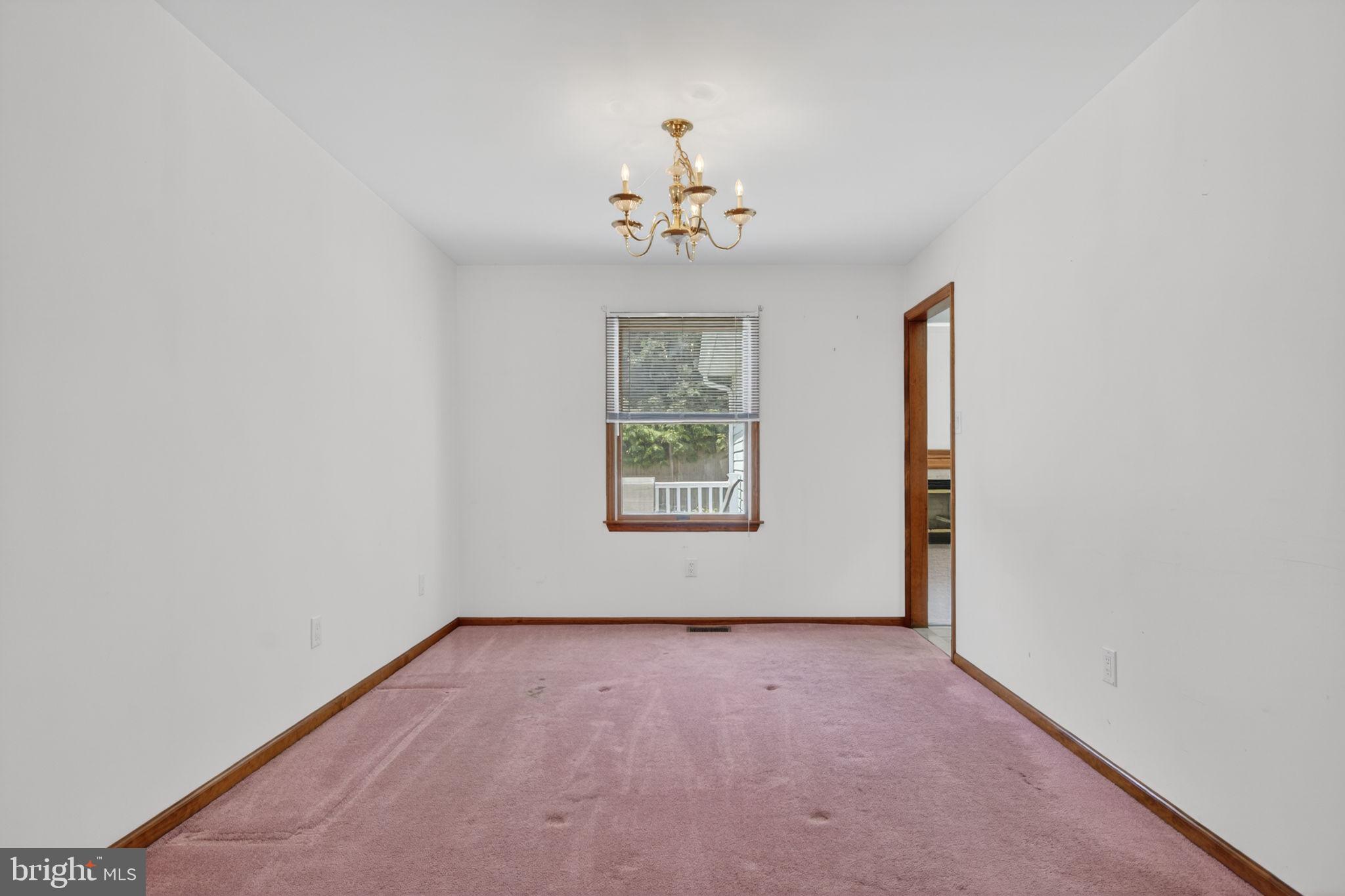 504 Ash Street Glassboro, NJ 08028 - Photo 10 of 42 an empty room with a window