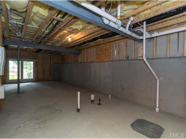 11545 Auldbury Way Raleigh, NC 27617 - Photo 18 of 25 The daylight basement offers a tremendous amount of options! Basements are so rare in Raleigh so this townhome is a great find! Basement