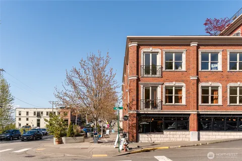 a front view of a building with street view