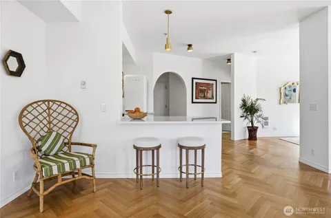 a view of a livingroom with furniture and lounge chair