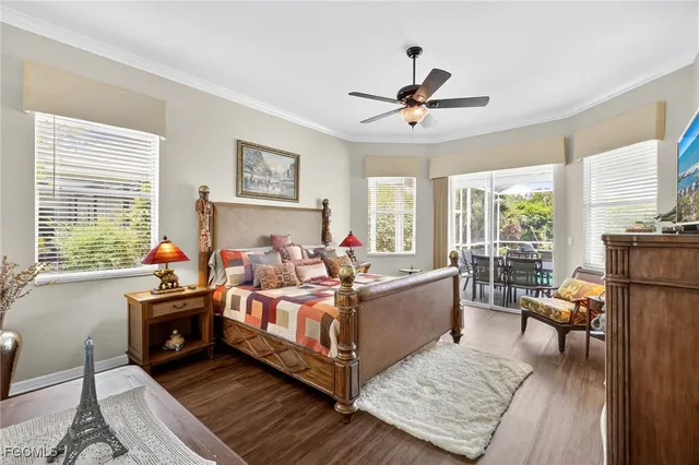 a bed room with bed and windows