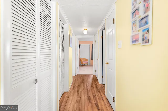 a view of hallway with washer and dryer