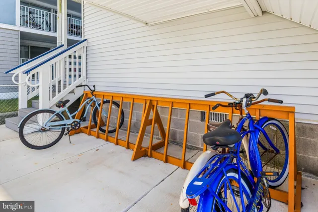 a view of houses with swimming pool