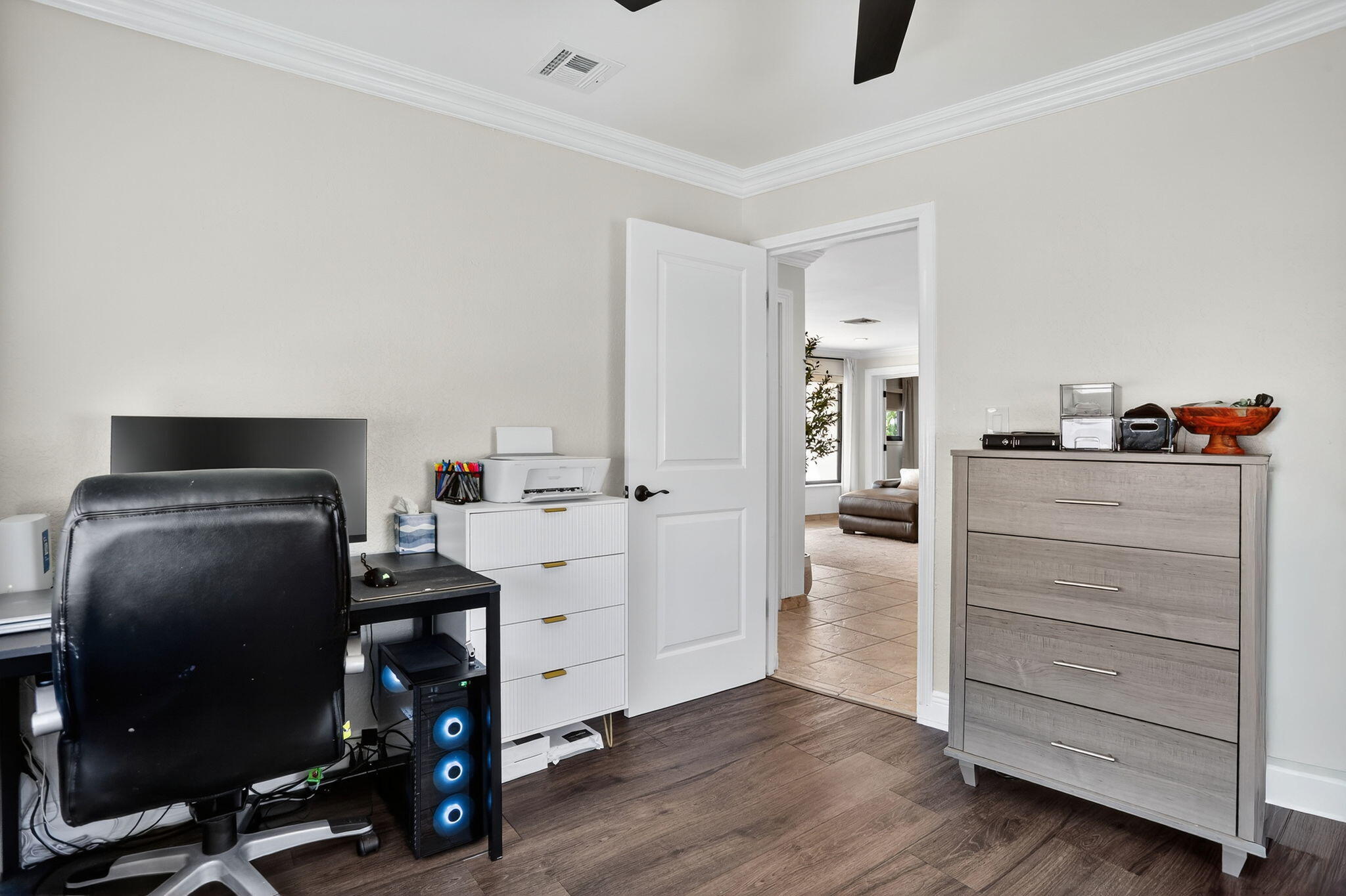 2840 Northeast 7th Terrace Pompano Beach, FL 33064 - Photo 22 of 42 a view of a workspace with furniture and wooden floor