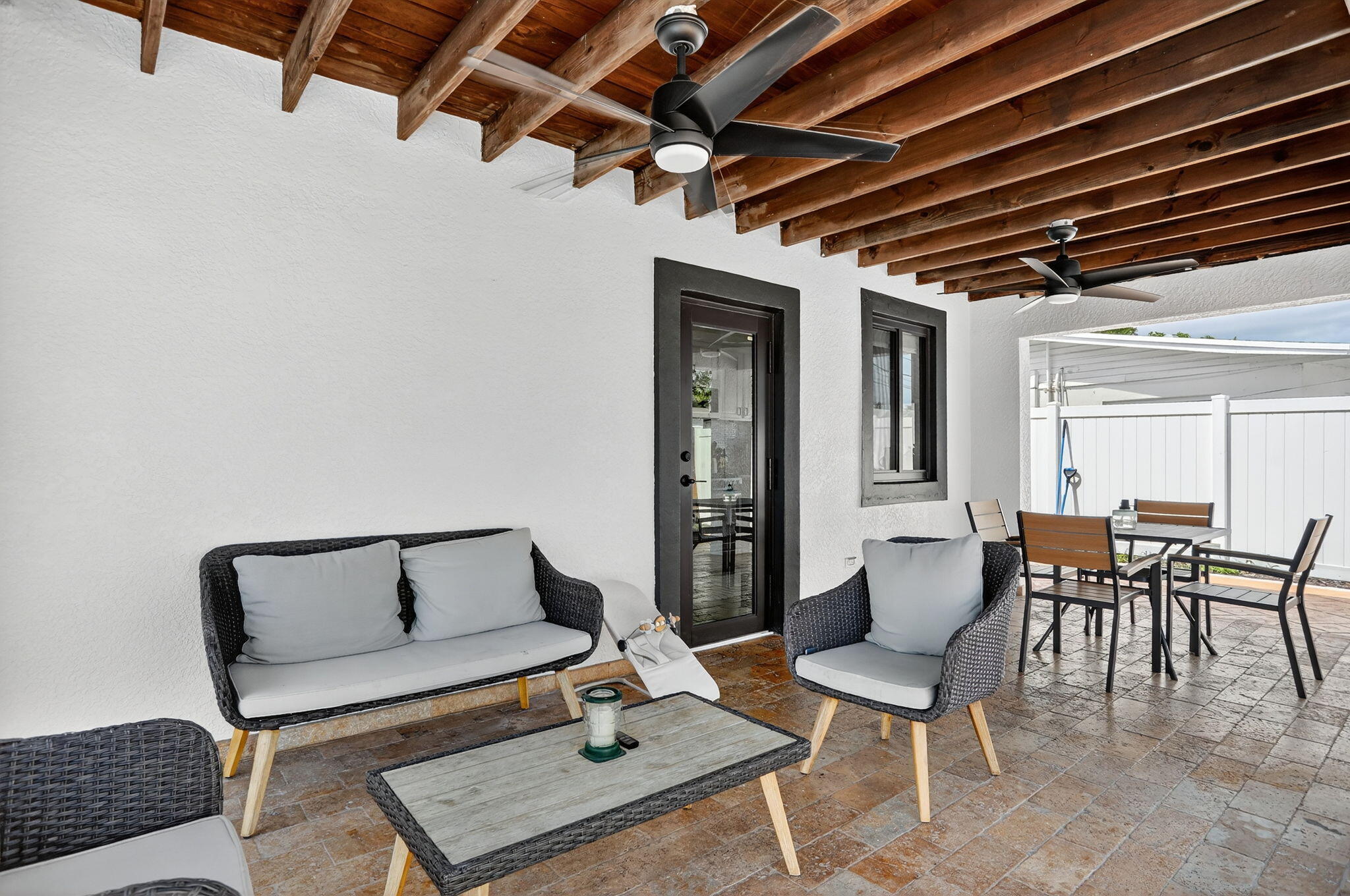 2840 Northeast 7th Terrace Pompano Beach, FL 33064 - Photo 26 of 42 a living room with furniture and a window