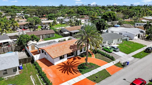 an aerial view of a swimming pool patio and mountain view