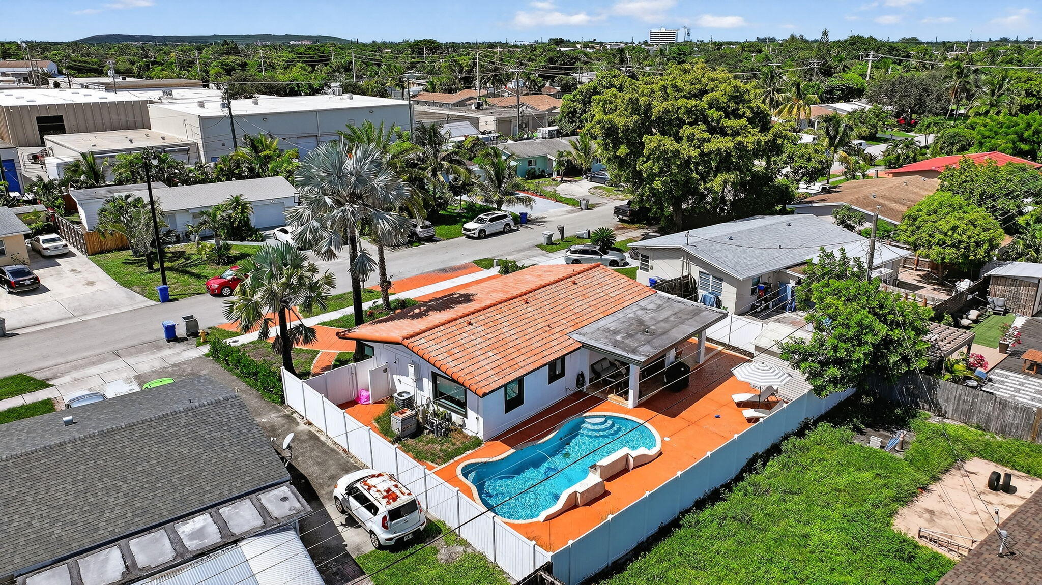 2840 Northeast 7th Terrace Pompano Beach, FL 33064 - Photo 4 of 42 an aerial view of a house with a big yard