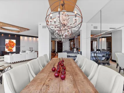 a kitchen with stainless steel appliances granite countertop a stove and a refrigerator
