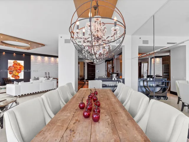 a kitchen with stainless steel appliances granite countertop a stove and a refrigerator