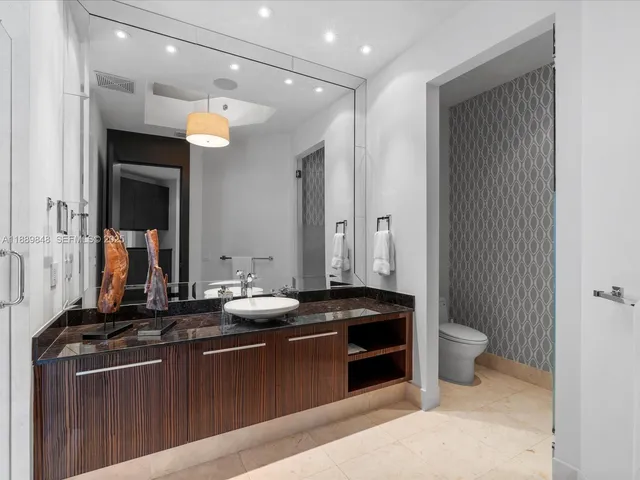 a view of a big yard with swimming pool and outdoor seating