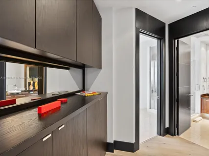 a large bathroom with a double vanity sink and a mirror