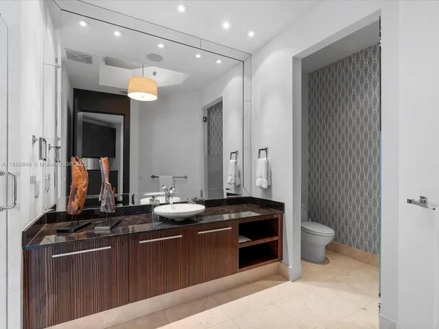 a outdoor living space with furniture and a floor to ceiling window