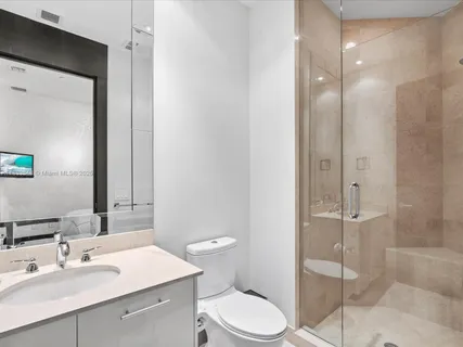 a view of a living room and dining room