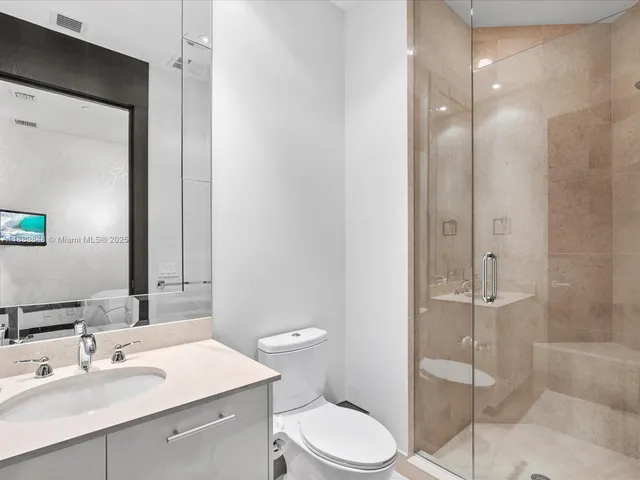 a view of a living room and dining room