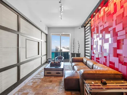 a room with furniture and white walls