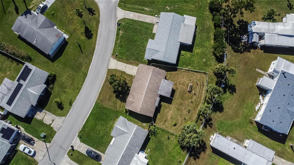 10801 Fillmore Avenue Port Richey, FL 34668 - Photo 9 of 29 an aerial view of houses with outdoor space