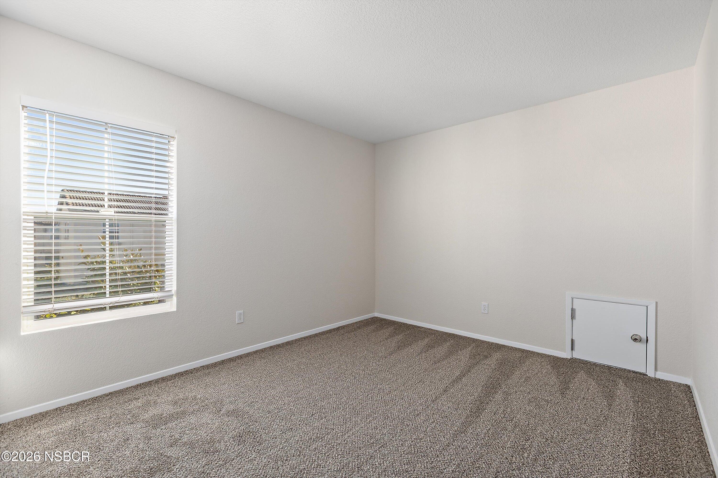 2020 Green Ridge Circle Lompoc, CA 93436 - Photo 10 of 20 a view of an empty room with a window
