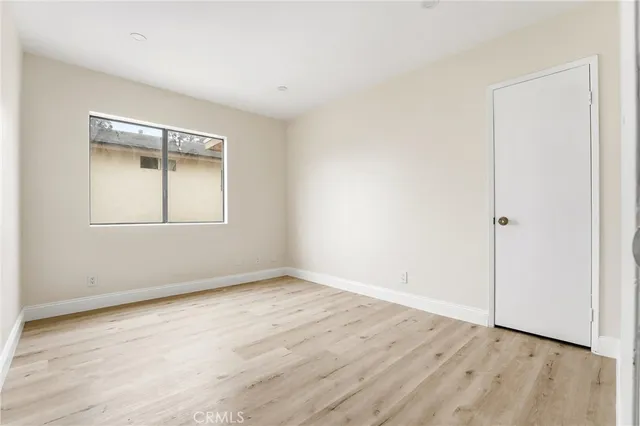 a view of a street with a building in the background