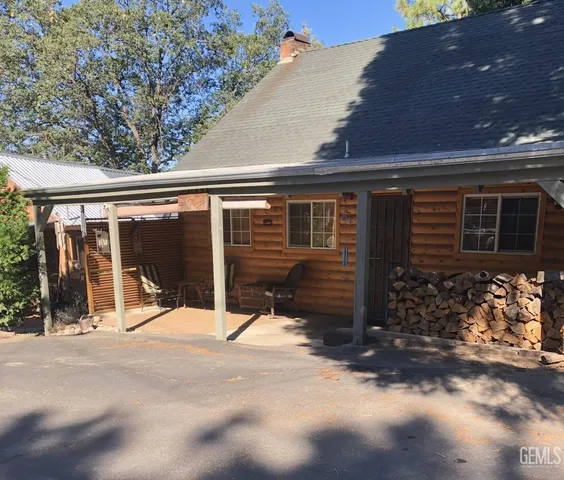 a view of house with a outdoor space