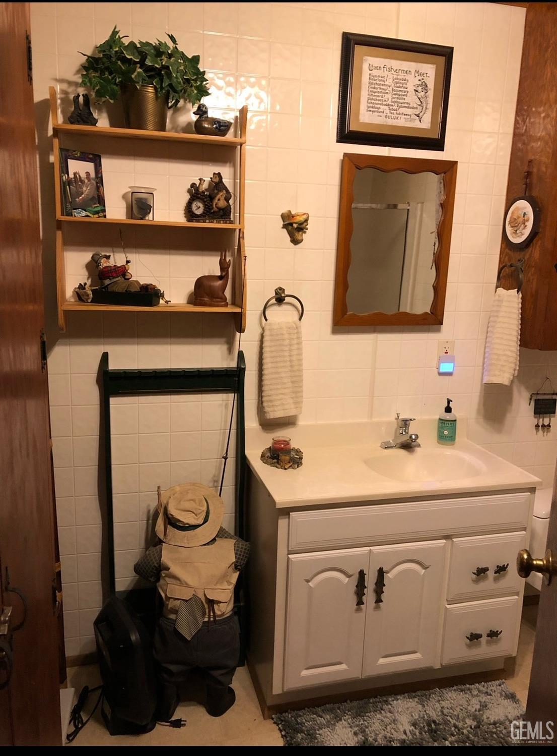 Undisclosed Address Posey, CA 93260 - Photo 11 of 16 a bathroom with a sink and a mirror