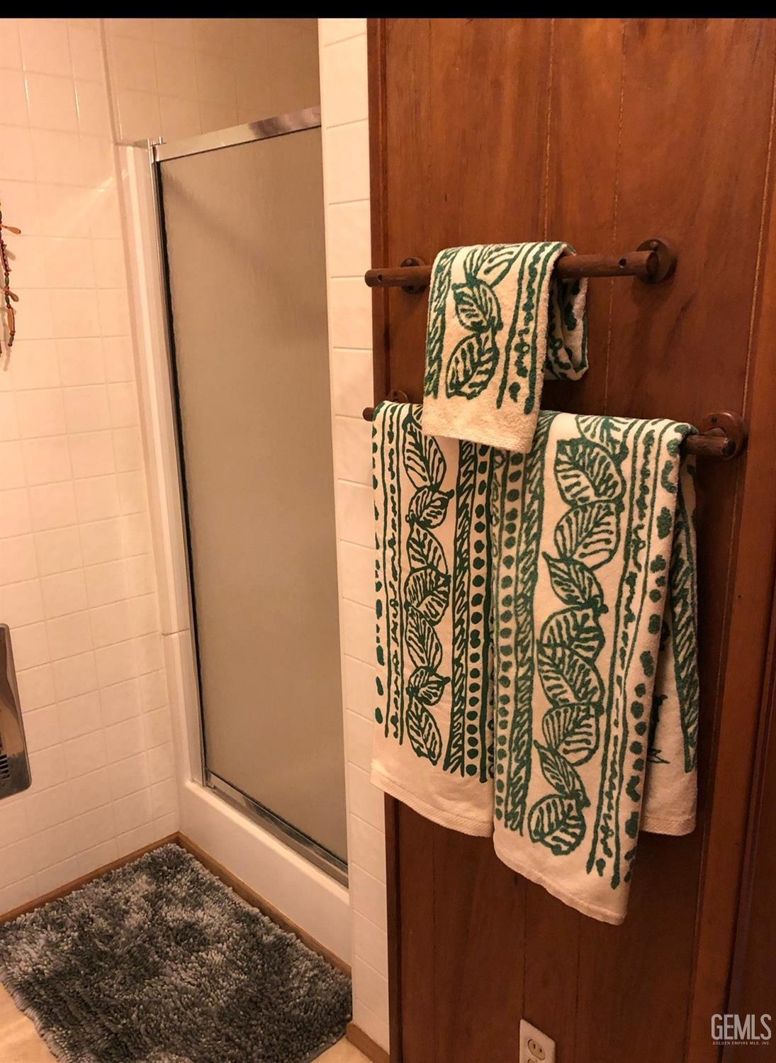 Undisclosed Address Posey, CA 93260 - Photo 12 of 16 a bathroom with a shower and a mirror