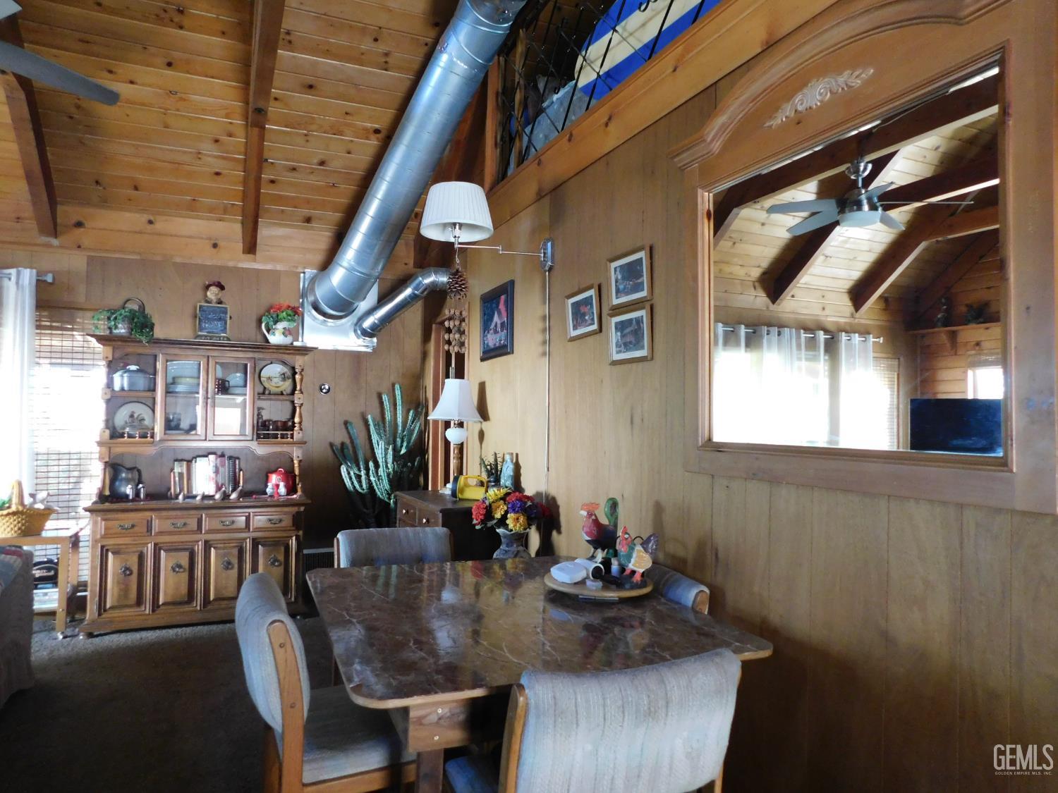 Undisclosed Address Posey, CA 93260 - Photo 6 of 16 a view of a dining room with furniture and a chandelier