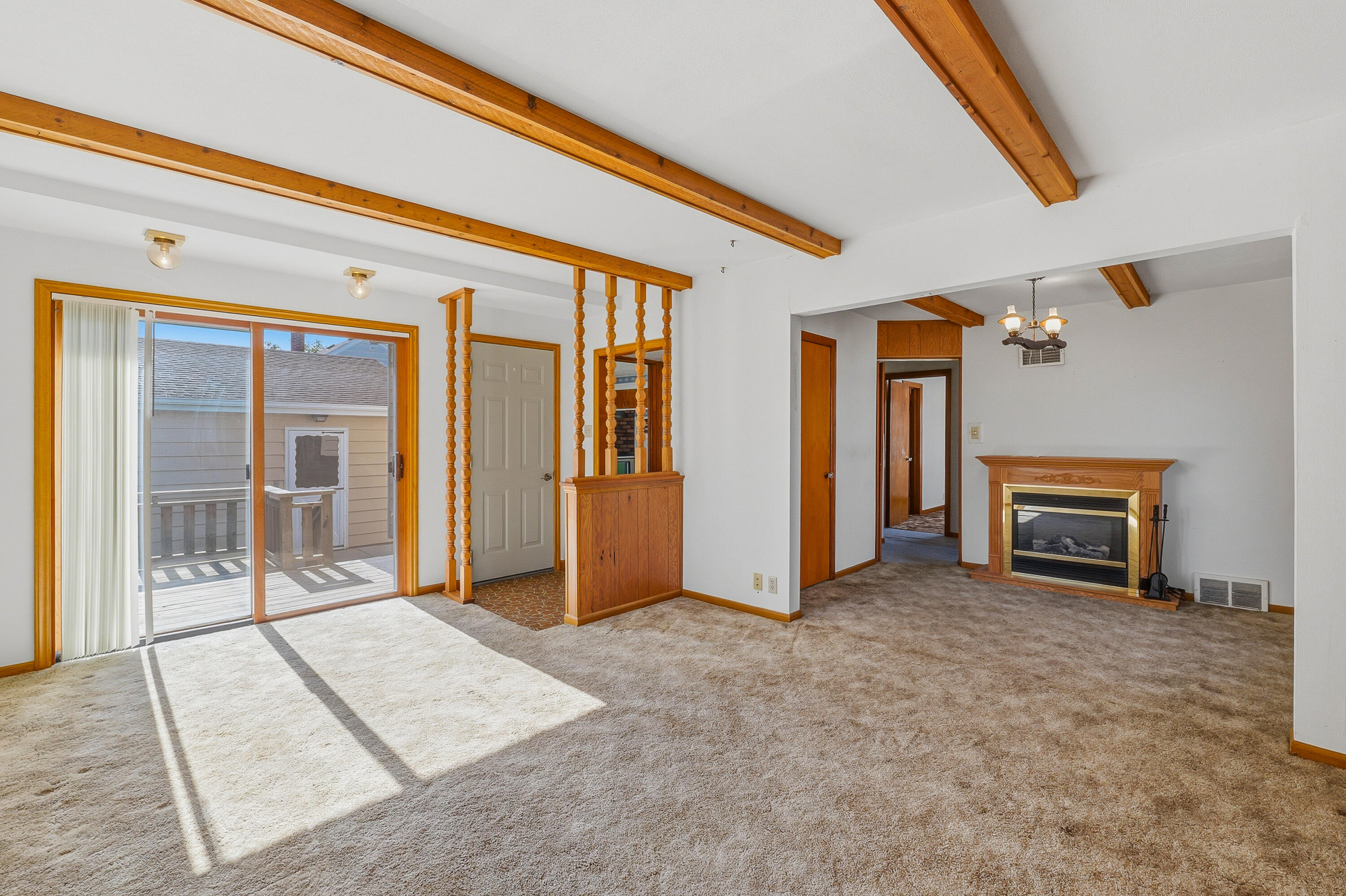 643 Grand Avenue Random Lake, WI 53075 - Photo 8 of 36 Family Room has Access to Deck