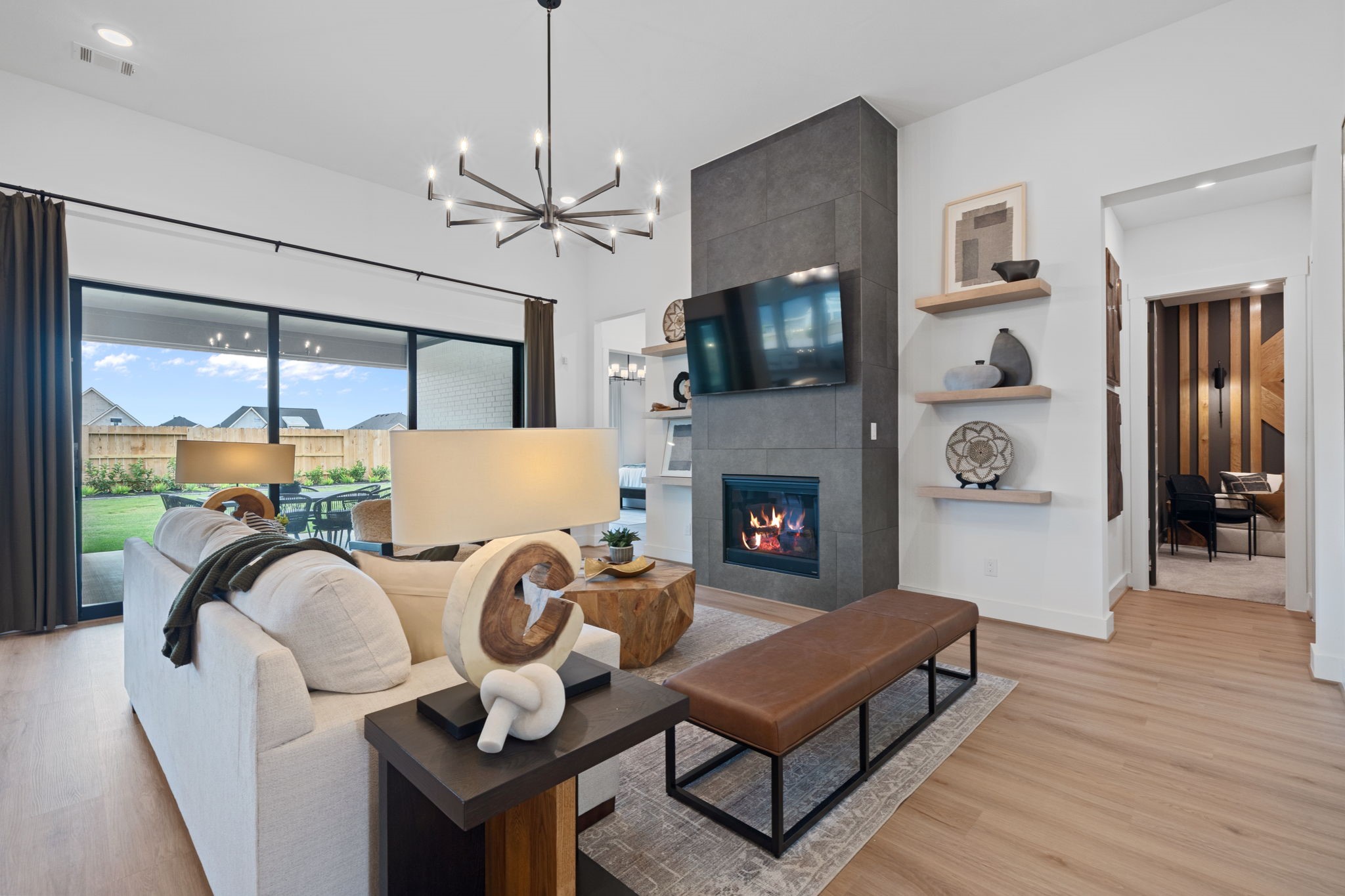 721 Cross Timbers Trace Hempstead, TX 77445 - Photo 9 of 22 a living room with furniture a flat screen tv and a fireplace