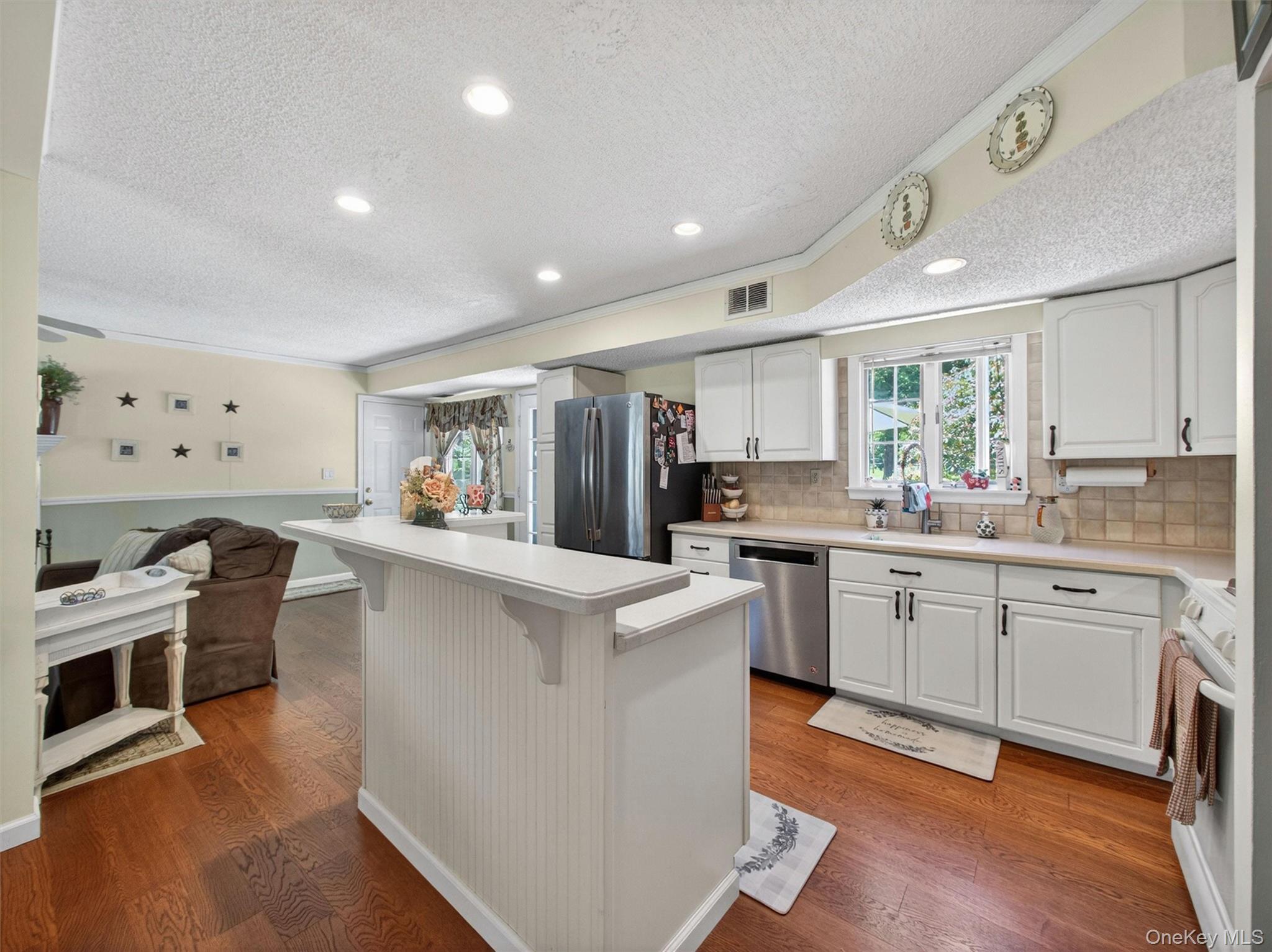 121 Sunset Road Blauvelt, NY 10913 - Photo 30 of 32 Eat In Kitch - Open Floor Plan with Kitchen Opens to Family Room with F/P