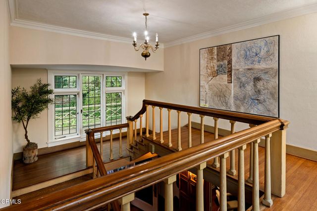 a view of balcony with furniture
