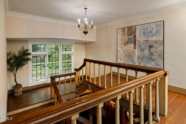 a view of balcony with furniture