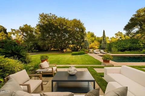 a view of a chairs and table on the terrace