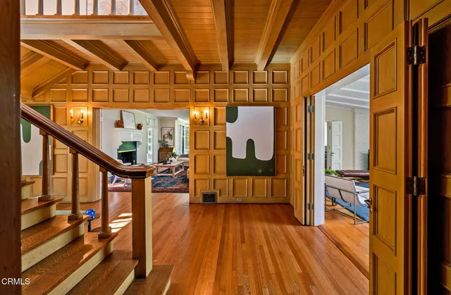 a view of entryway with wooden floor