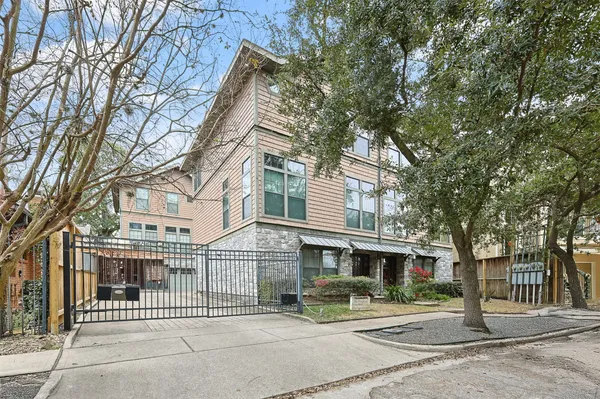 a view of a building with a tree