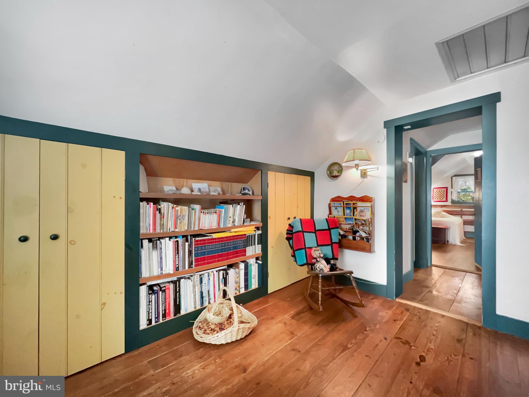 1095 Texter Mountain Road Denver, PA 17517 - Photo 14 of 37 a view of a room with workspace and wooden floor