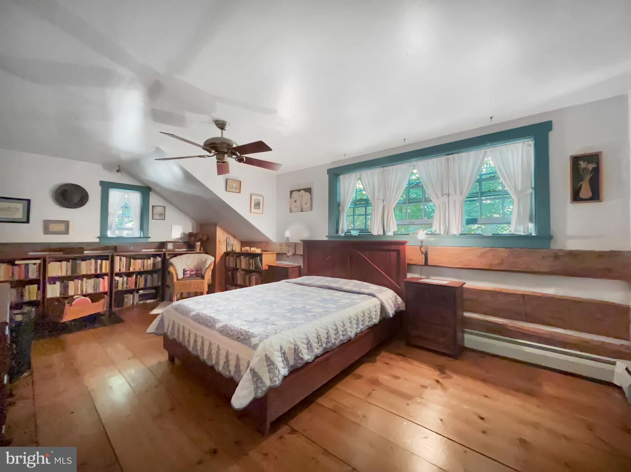 1095 Texter Mountain Road Denver, PA 17517 - Photo 15 of 37 a bedroom with a bed and a large window with the outer view