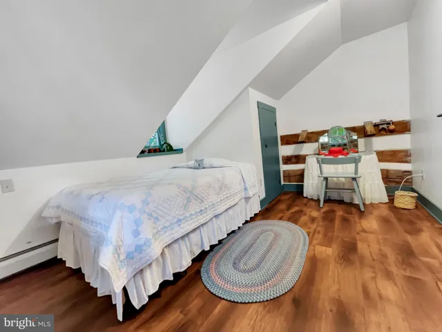 a room with a table and a chairs