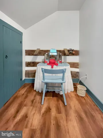 a room with furniture and a book shelf