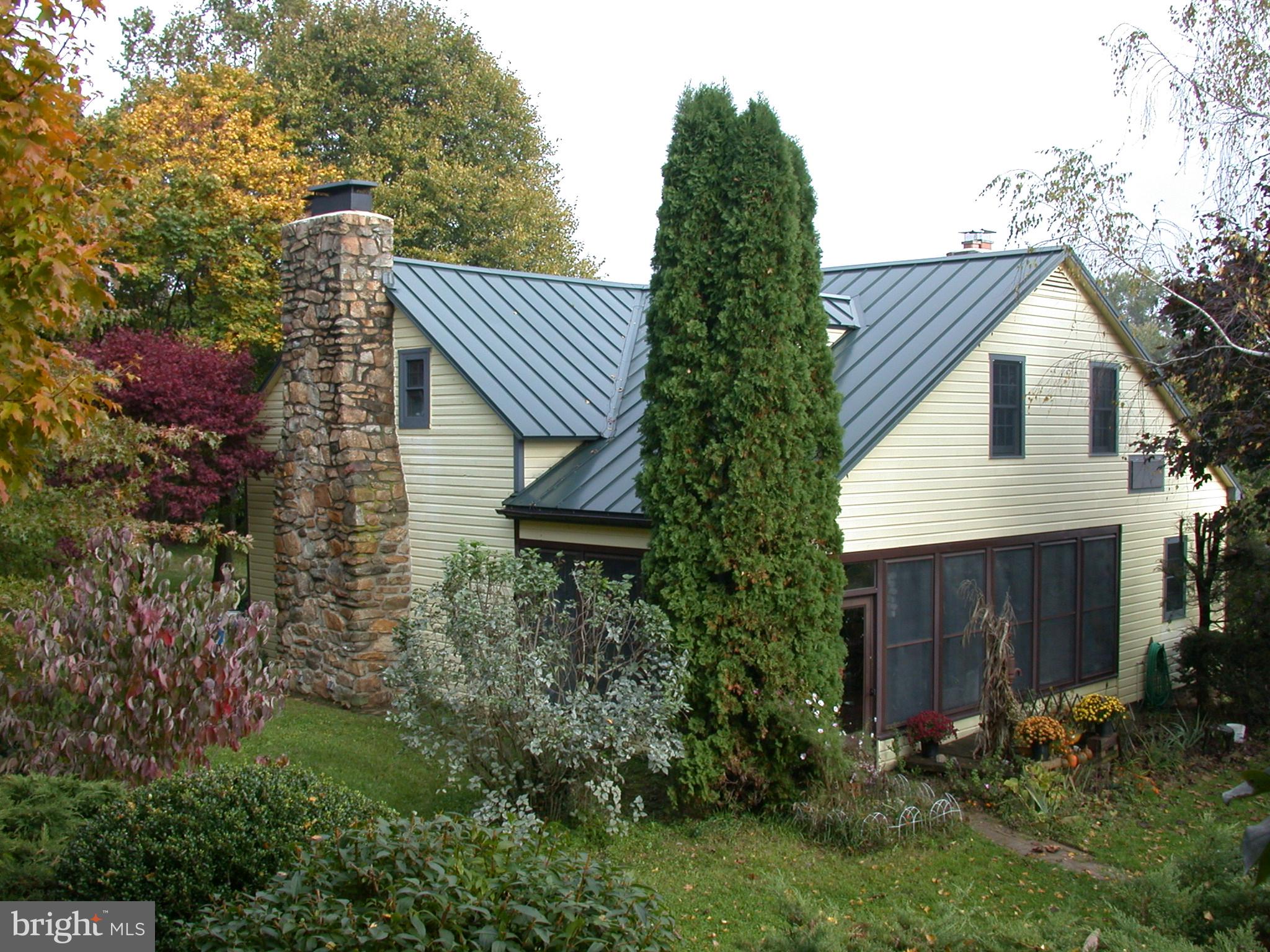 1095 Texter Mountain Road Denver, PA 17517 - Photo 23 of 37 a view of house with outdoor space and sitting area
