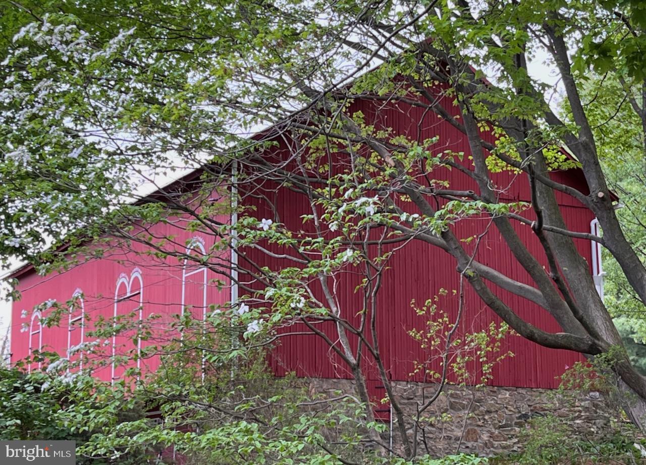 1095 Texter Mountain Road Denver, PA 17517 - Photo 28 of 37 a view of a house with a tree