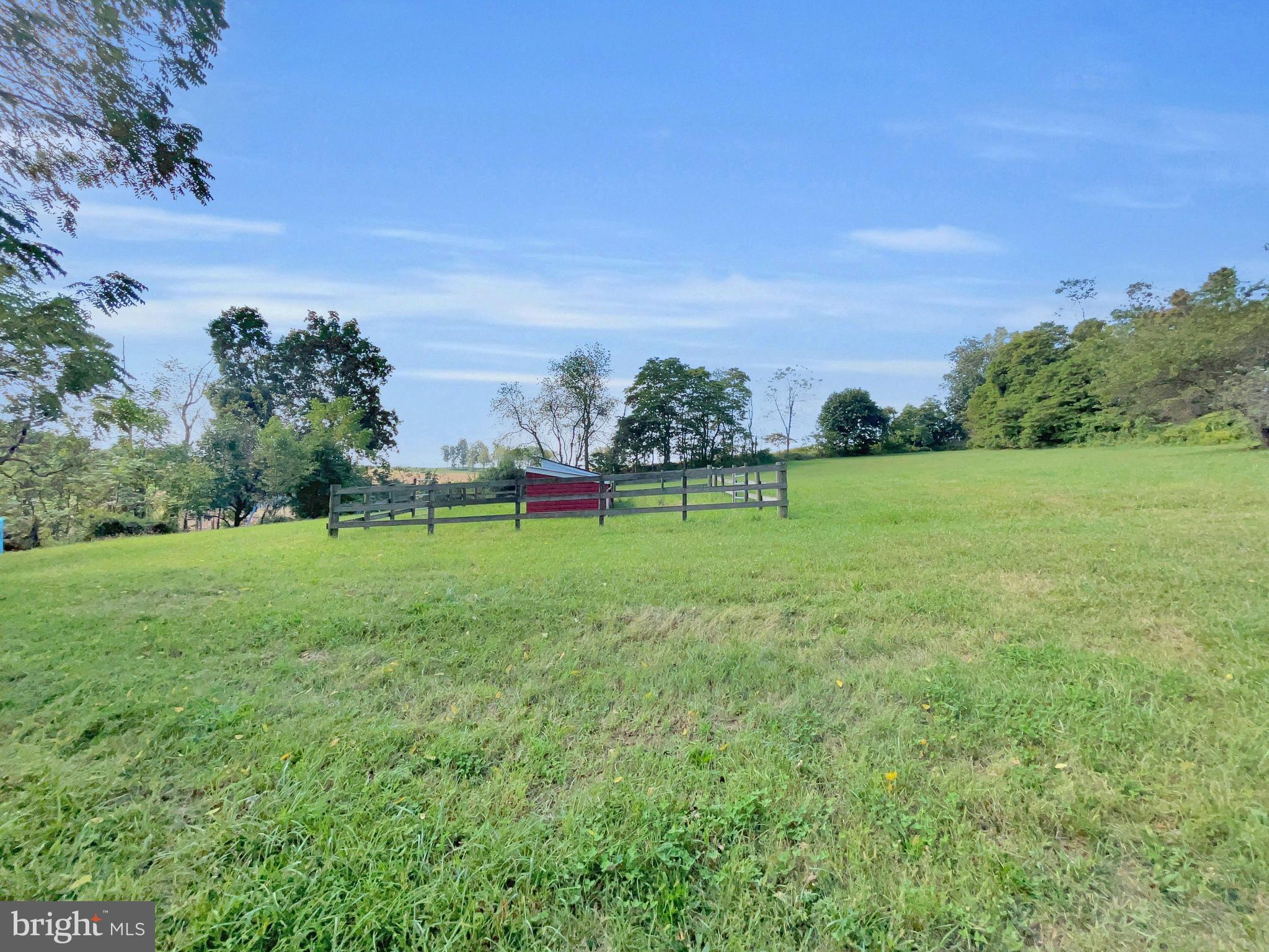 1095 Texter Mountain Road Denver, PA 17517 - Photo 30 of 37 a view of outdoor space with green field and trees all around