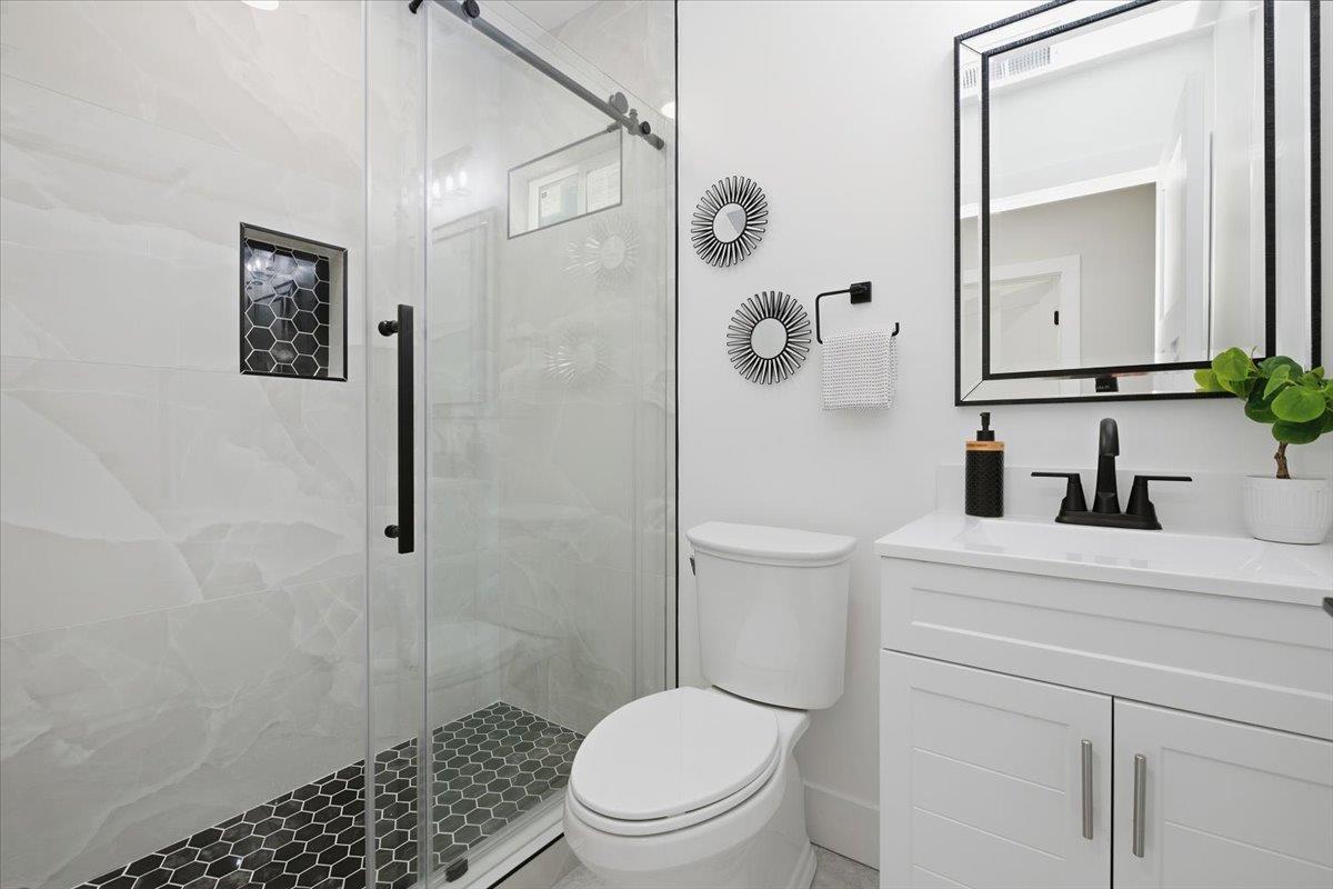 40 Valley View Avenue San Jose, CA 95127 - Photo 16 of 27 a bathroom with a sink a toilet and shower