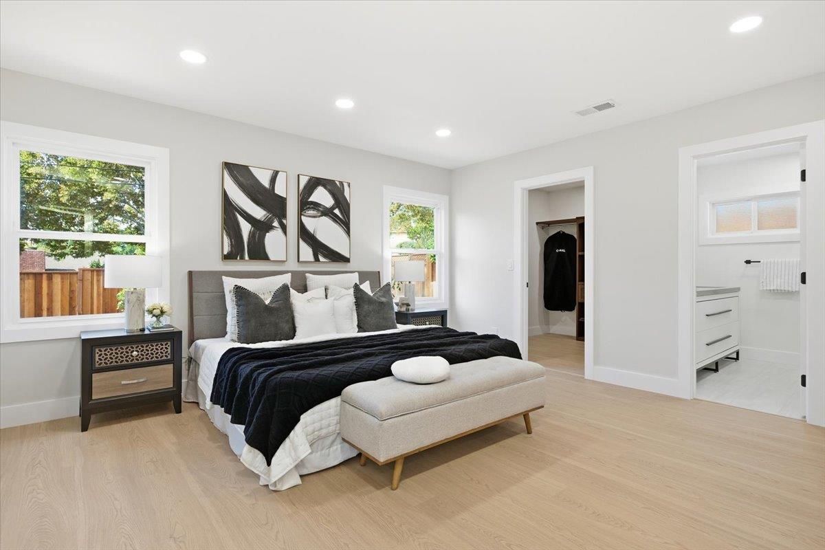 40 Valley View Avenue San Jose, CA 95127 - Photo 17 of 27 a spacious bedroom with a bed and a cabinets