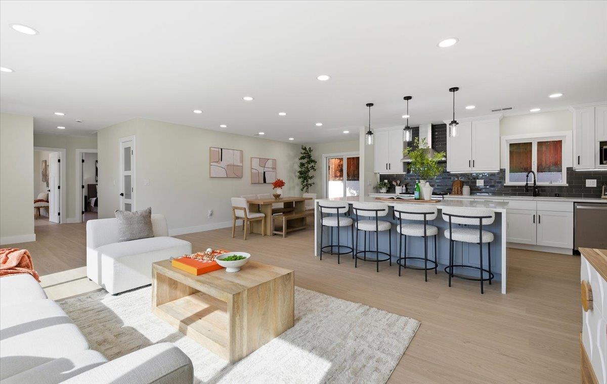 40 Valley View Avenue San Jose, CA 95127 - Photo 5 of 27 a living room with stainless steel appliances kitchen island granite countertop furniture and a kitchen view
