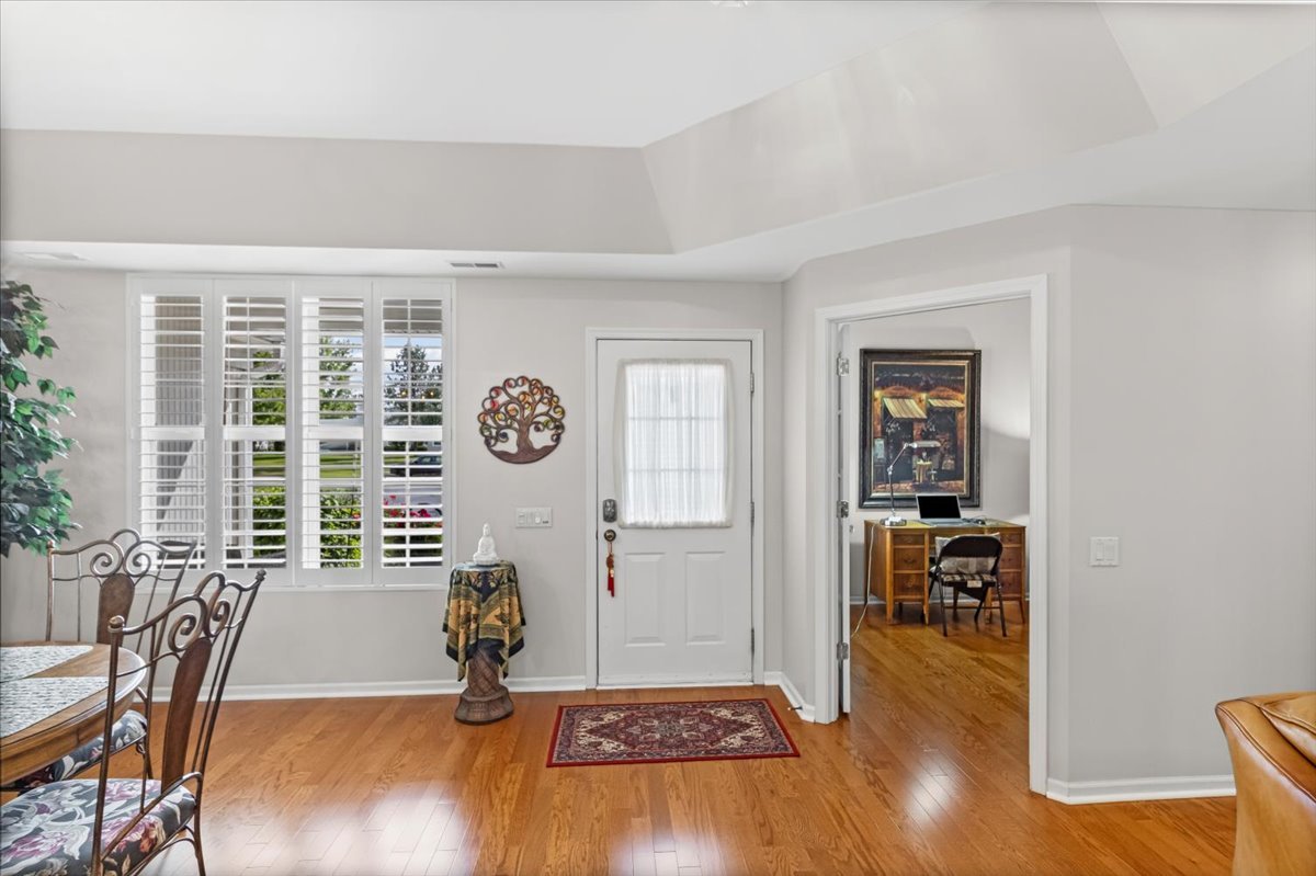 13544 Delaney Road Huntley, IL 60142 - Photo 3 of 21 a living room with furniture and a table