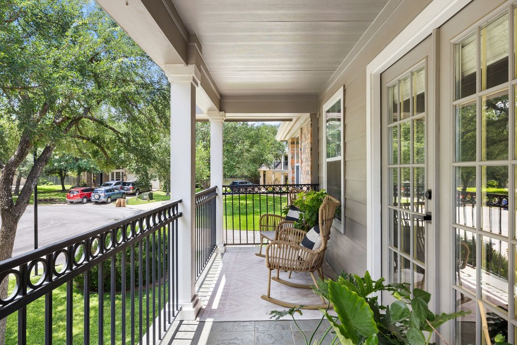6704 Kiev Cove Austin, TX 78739 - Photo 12 of 37 Relax on the inviting porch, featuring elegant railing and welcoming entry.