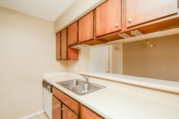 a kitchen with a sink and a cabinets