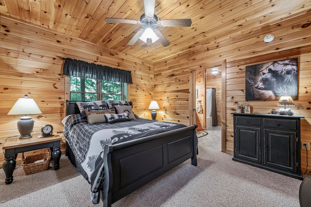 115 Lakota Trail Blue Ridge, GA 30513 - Photo 34 of 49 a bed room with a bed and a dresser