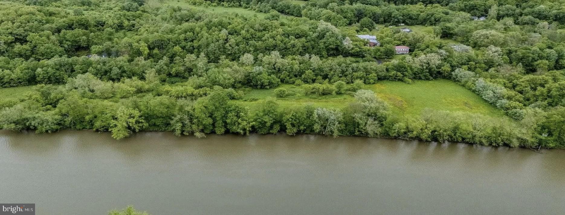 436 State Line Road Susquehanna, PA 18847 - Photo 5 of 35 an aerial view of a houses with a yard and lake view